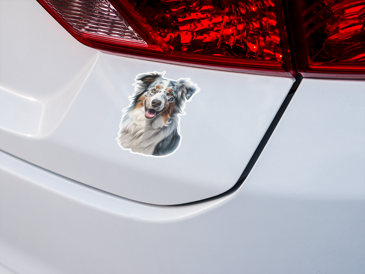 A vinyl sticker depicting an Australian Shepherd dog with a smile, featuring a colorful coat and expressive eyes.